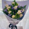 Choice of 12 white roses with fillers. Wrapped in the unique Asian-style
