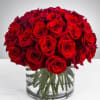 Bouquet of red roses in a clear glass vase