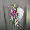 Pink rose spray on a silver heart-shaped stand