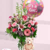 Pink mixed flower bouquet with a "It's a Girl" balloon and teddy bear