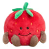 Strawberry-shaped plush toy with a smiling face