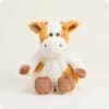 Plush cow toy with white and orange fur
