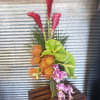 You they love they Tropics. Send them this fun vase of Tropical