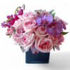 Send this designer's choice pastel blossom beauty in a sleek modern black