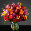 Exquisite blooms mixed with Cala, roses, fragrant stock and sprays. Color palette