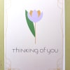 Thinking of you greeting card with a simple pastel flower illustration