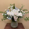 Seasonal mix of beautiful white and cream florals.