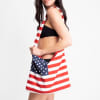 Patriotic shoulder bag with American flag design worn by a woman in a black bikini