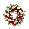 Red and white floral wreath on a stand