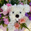 basket arrangement with doggy made with carnation 