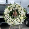 all white funeral wreath easel