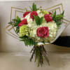 This bouquet Roses and Hydrangeas with simple Greenery in a Wrap