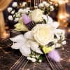 This beautiful corsage made with white dendrobium orchid , white spray 