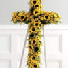 Yellow sunflower cross on a metal stand