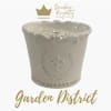 Cream ceramic candle jar with gold logo and text