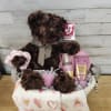 Cute little basket in shades of pink, basket contains:

- Watercolor Heart Tea