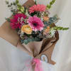 Spring Blooms in a modern hand bouquet. Beautiful Spring colors. 
