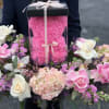 Pink rose box arrangement with white and blush flowers around it