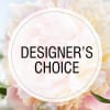 Soft pink and cream flowers behind a circular "Designer’s Choice" label