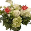 Low glass vase arrangement with white roses, white calla lilies, green hydrangeas, and coral roses.