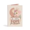 Greeting card with pastel flowers and the words strength and hope