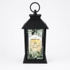 Black memorial lantern with a printed remembrance message and faux candle glow