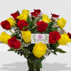 12 yellow roses and 12 red roses in vase with BB.