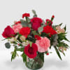 Mix arrangement with red and pink low cylinder vase