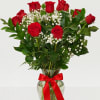 Red Rose's in a vase always make someone happy they came 3