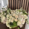 Pastel color roses, with greens and mix white filler