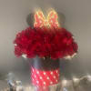 Red roses in a black hatbox with a Minnie Mouse bow topper