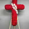 Red rose cross with white orchids on an easel