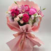 A soft and elegant hand-tied bouquet designed in romantic shades of pink