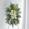 A collection of bold blue flowers shares a tribute that words cannot