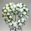 White rose wreath on a standing easel