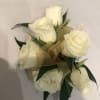 White roses, ribbon and greens for pin on or for on a