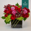 Roses and orchids always perfect together. arrenged in a way that they