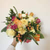 A fun mix of fresh cut flowers.