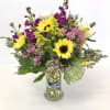 A custom designed arrangement by Fairbanks Florist. A beautiful collection of mixed