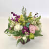 A custom designed arrangement by Fairbanks Florist. A beautiful collection of mixed