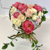A custom designed arrangement by Fairbanks Florist. A custom heart shaped floral