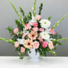 Playful pink and white blooms celebrating life and your loved one. 