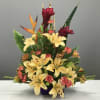 Tropical greens coupled with Birds of Paradise and Red Ginger are serving