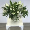 A serene combinations of fresh white blooms to celebrate the life of
