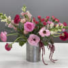 Pink and red mixed bouquet in a silver vase