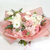 Pink and white mixed bouquet wrapped in translucent pink paper