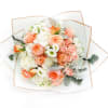 Radiating warmth and elegance, this handcrafted bouquet features lush peach garden roses