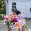  A magnificent display of garden-like blooms. Seasonal flowers designed in a