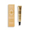 Gold lip balm tube beside matching box on a white background