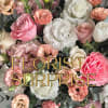Freshly arranged florist's choice bouquet in a tasteful vase; flower varieties and